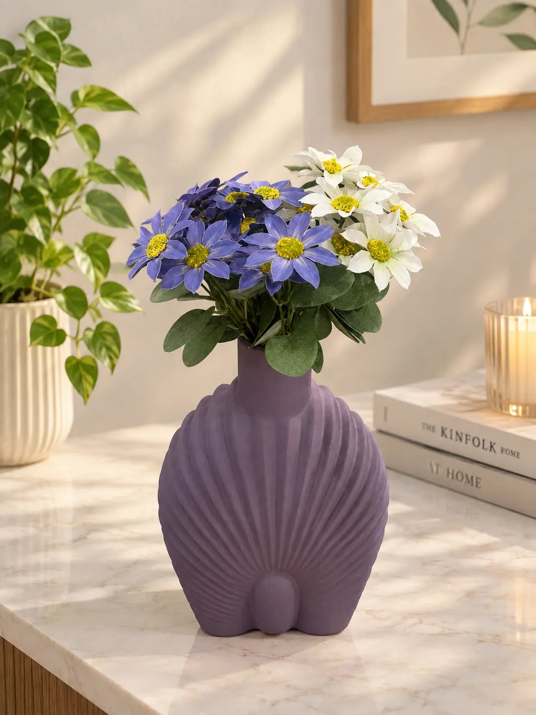 purple-ribbed-vase-with-artificial-flowers