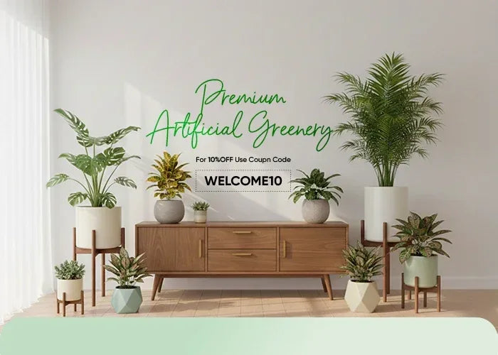 Living room with artificial greenery and a wooden console table, featuring promotional text for premium artificial greenery.