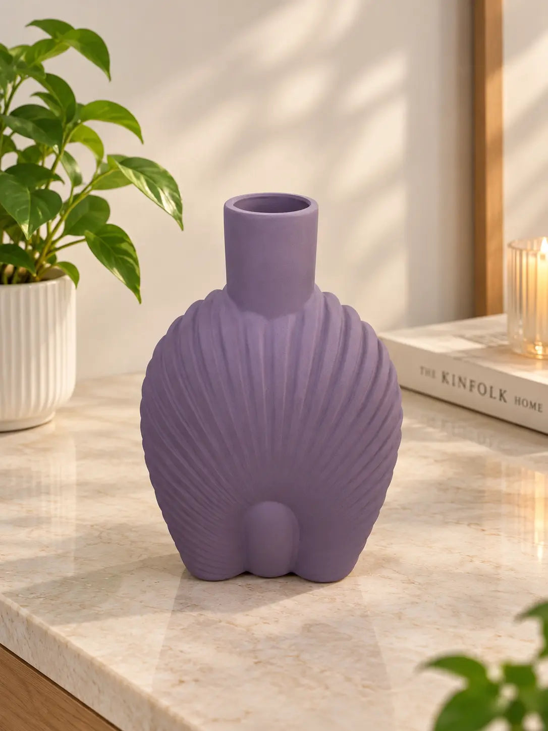 purple-ribbed-vase-with-artificial-flowers